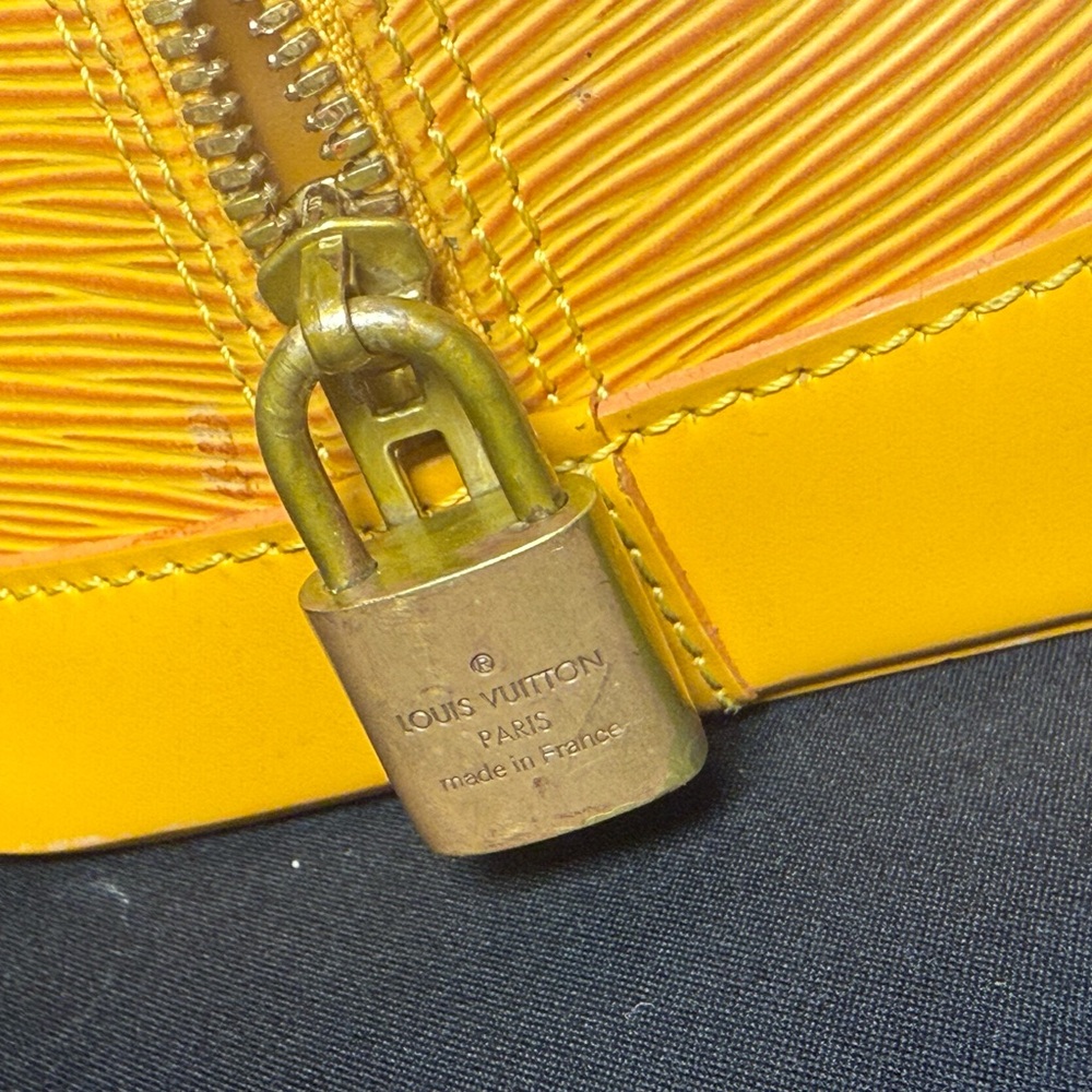 LOUIS VUITTON - ALMA EPI YELLOW with purple suede interior great condition!!! - Picture 9 of 13